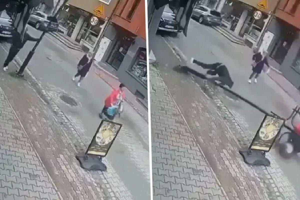 Telefonla konuşurken yaslandığı sokak lambası bir bayanın üzerine devrildi